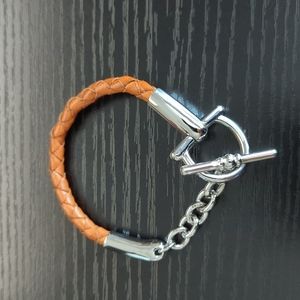 Silver and braided leather bracelet